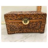Bird design on wooden box carved by hand