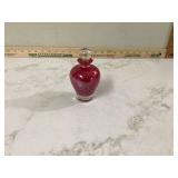 Red glass perfume bottle