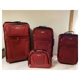 SET OF 4 RED SUITCASES