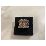 Sterling silver ring with size 7 purple stone