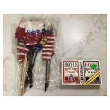 Mini flags and playing cards with dice