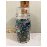 Vintage marbles in decanter