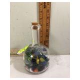 Vintage marbles in decanter