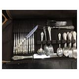 Elegant silver flatware set in box