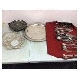 Silver serving set with platter dishes and utensils