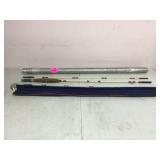 FISHING POLE IN METAL CASE