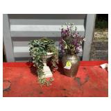 Metal vase with artificial plant for decoration