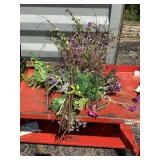 Large tote filled with artificial flowers