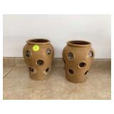 Two large plastic strawberry planters