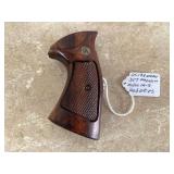 Smith & Wesson revolver with wood grip