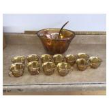 Golden amber punch bowl with iridescent finish grape design Indian origin