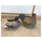 Damaged rooster statue and duck-shaped bowl