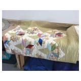 Old handmade quilt and bedspread