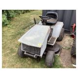Non-functional lawn mower crafted for riding
