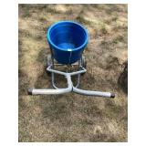 Tool for spreading material evenly