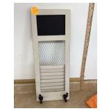 Wall-mounted message and hat holder with louvers