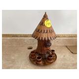 Wooden tiki hut liquor dispenser with missing shot glass
