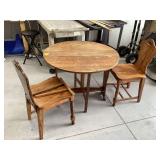Antique folding table and 2 chairs in need of repair