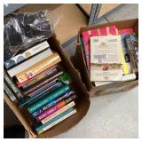 Books and VHS tapes of various genres and topics