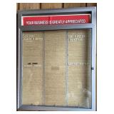 Glass display letter board with letters and