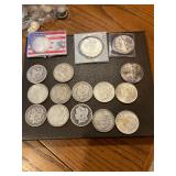 Several silver dollars 