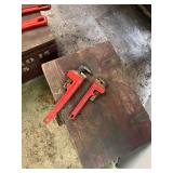 Several pipe wrenches 