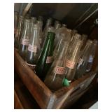 Wood box with vintage bottles 