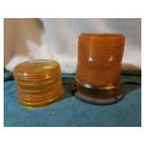 2-Amber revolving lights,with one extra lens.