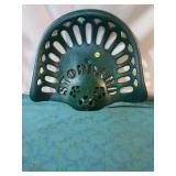 Stoddard cast iron tractor seat.