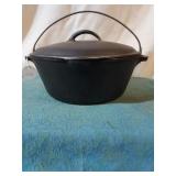 Lge. Cast iron Dutch Oven w/lid.