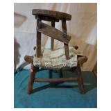 Primative stools (2). One was possibly milking