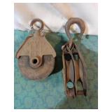 Barn pulleys. One all metal, one C.I. & wood.