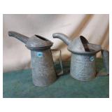 (2) 1-quart oil measures. One is NYC-PA RR can.