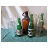 Brown Clorox, medicine, soft drink bottles.