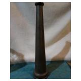 Large brass fire hose nozzle.