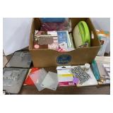 Box of Cricut Cuttlebug Embossing Supplies