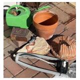 Terracotta planter, water can & landscape art