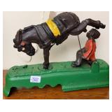Cast Iron Boy Kicked By Horse Coin Bank
