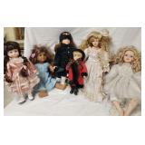 Dolls, need cleaned, one has angel wings