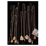 Long gold tone necklaces with pendants