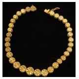 14K yellow gold graduated round link bracelet
