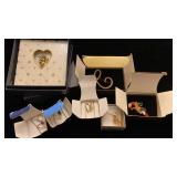 Avon necklaces and pins in original boxes