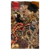 Gallon bag of miscellaneous jewelry