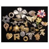 Metal brooches