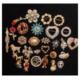 Small rhinestone or Pearl like brooches