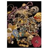 Gallon bag of miscellaneous jewelry
