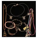 Leather strap, bracelets, and necklaces