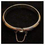 Sterling silver hinged bangle with gold overlay