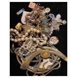Quart bag of miscellaneous jewelry