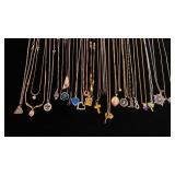 Pendants on various length necklaces